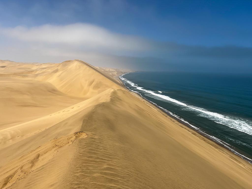 Der Atlantik und die namibische Küste sind sehr sauber; © Viktoriia Makarova/iStock